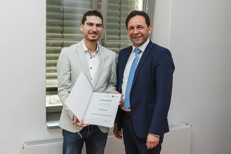 ÖbVI Sebastian Baier mit GeoSN-Präsident Ronny Zienert